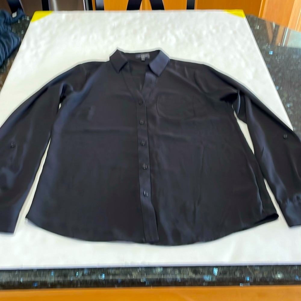 Limited dress shirt size small. In excellent shape.